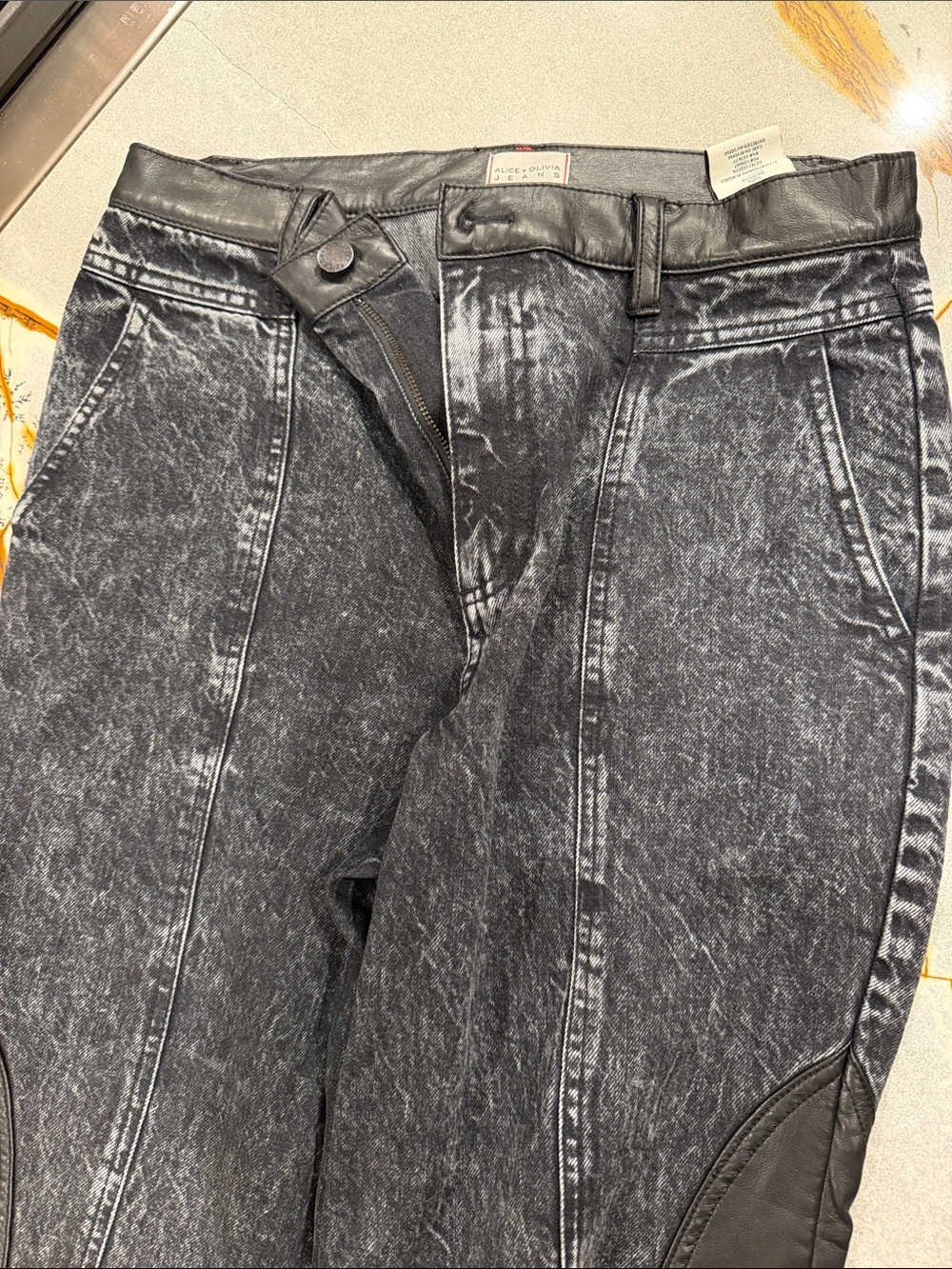 Alice + Olivia Women’s Washed Black Relaxed Jeans with Faux Leather Accents